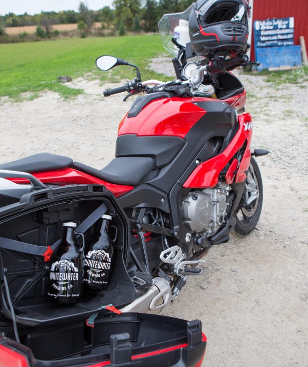 Growlers in the saddle bag of a motorcycle