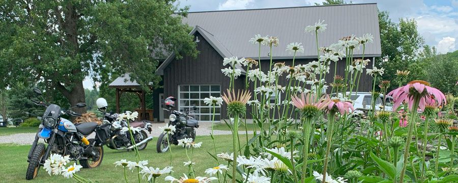 Motorcycles parked in front of building. 