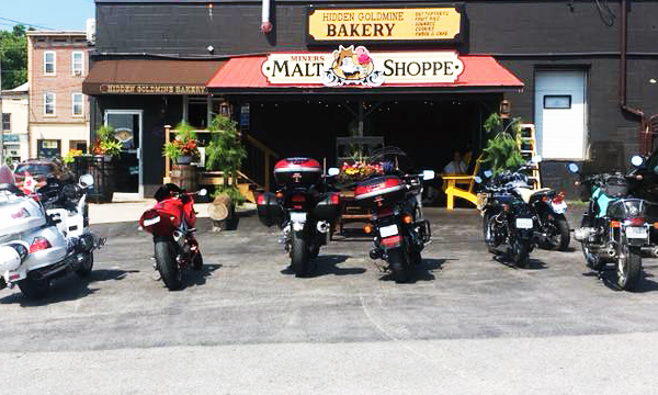 Motorcycles in front of ice cream shop