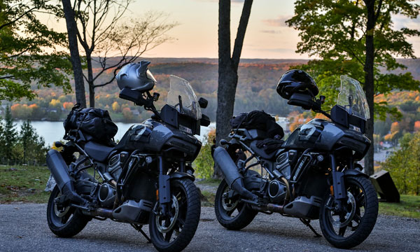 Two motorcycles with view of Haliburton from Skyline Park