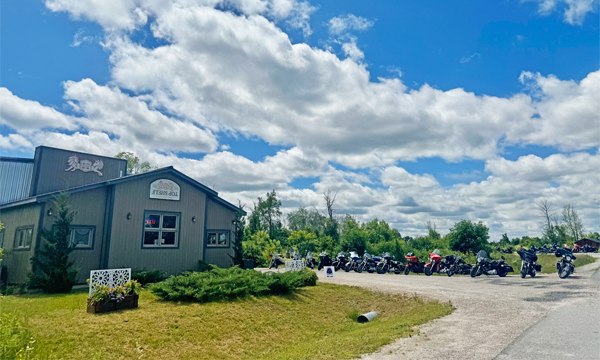  Distillery exterior with motorcycles parked outside