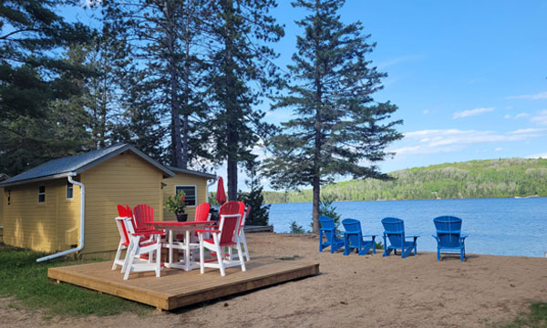 Cottage by the lake with sunset